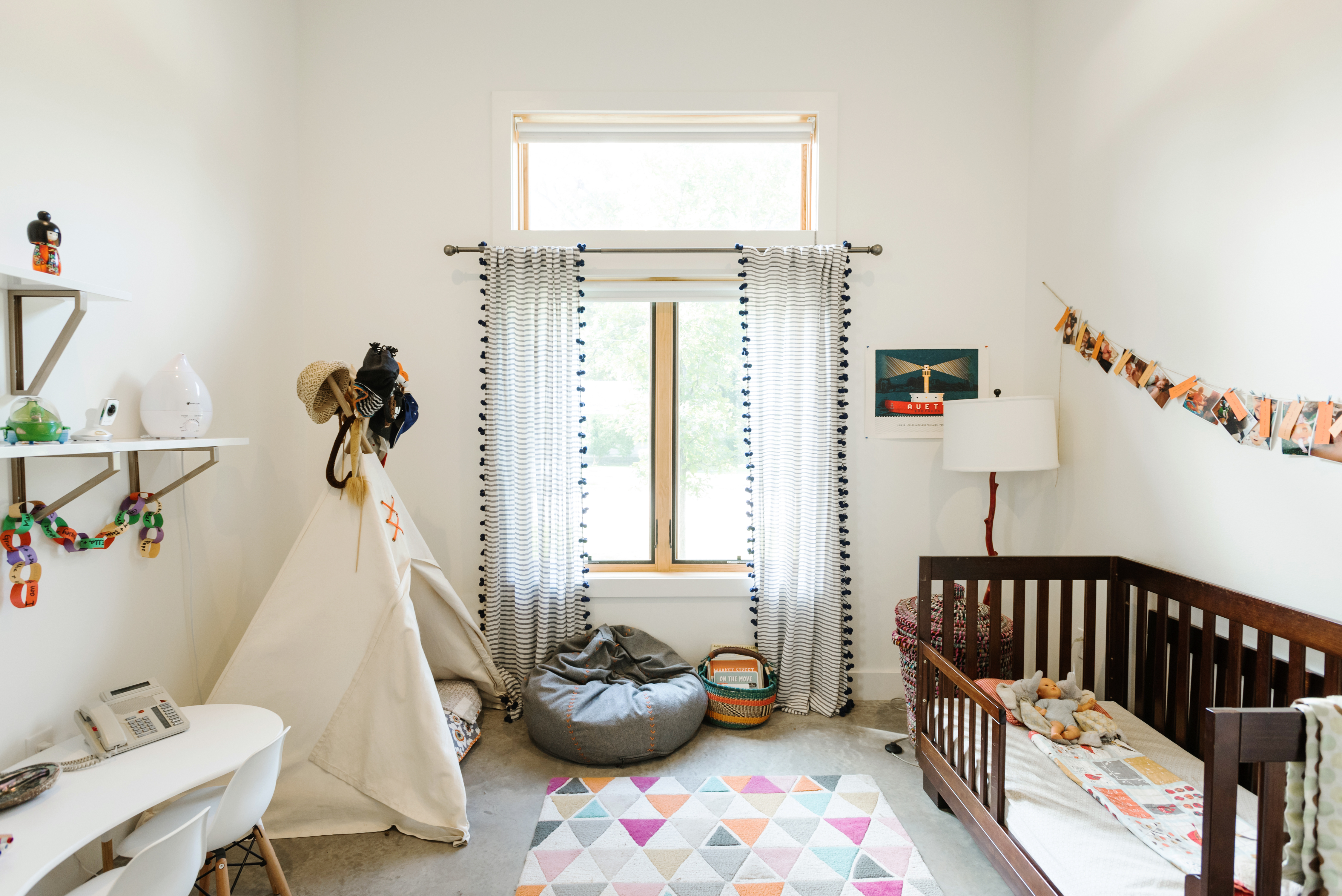 A family friendly home in Austin showing a room with a cot, toys and a teepee for young children