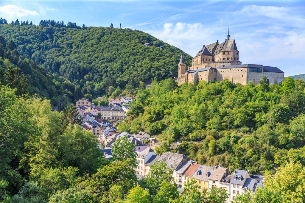 Vianden castle and a small valley in Luxembourg.