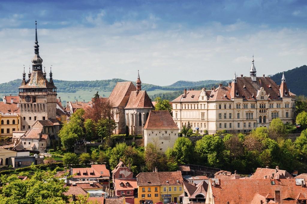 Panoramic view over the cityscape architecture in Sighisoara town, Romania.