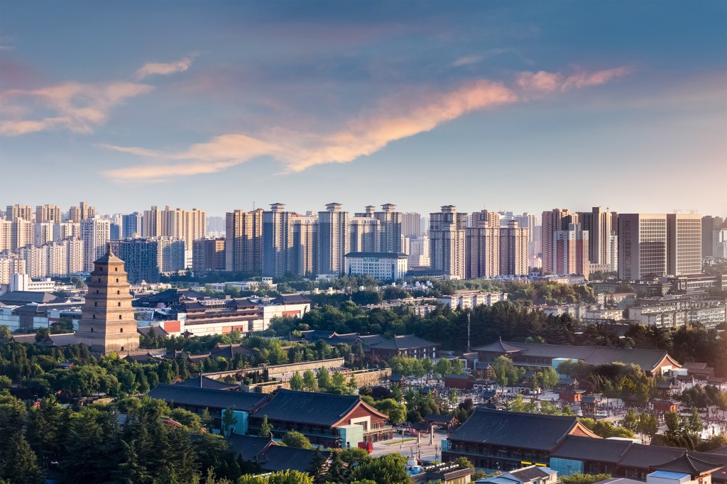 Skyline and pagoda at dusk in Xi'an, China.