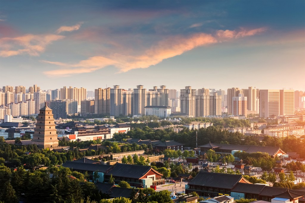 Skyline and pagoda at dusk in Xi'an, China.