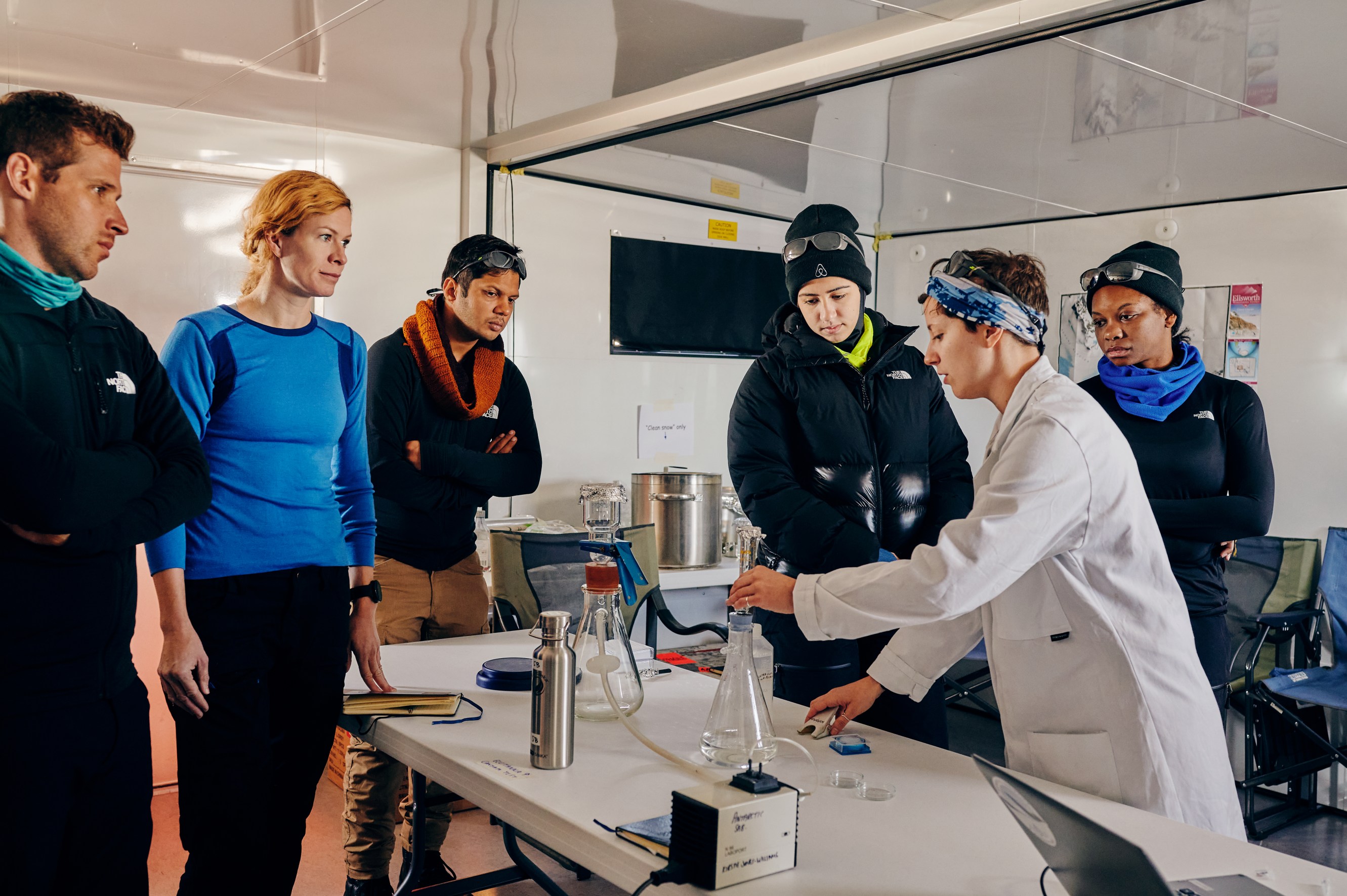 Kirstie explains the rigorous scientific protocol to the Antarctic Sabbatical volunteers