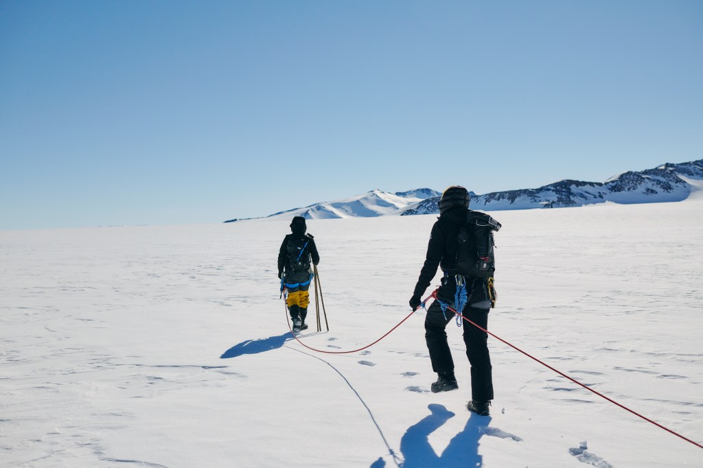 For safety reasons, expeditioners have to be roped together when out in the field