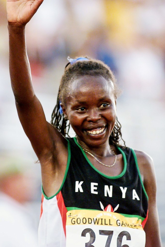 Gold medalist, World Record holder and sporting legend, Tegla Loroupe waving after finishing a race.