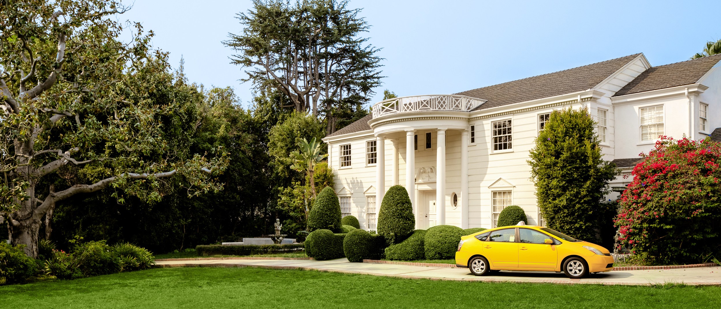A taxi arrives at the mansion featured in the Fresh Prince of Bel-Air TV show.