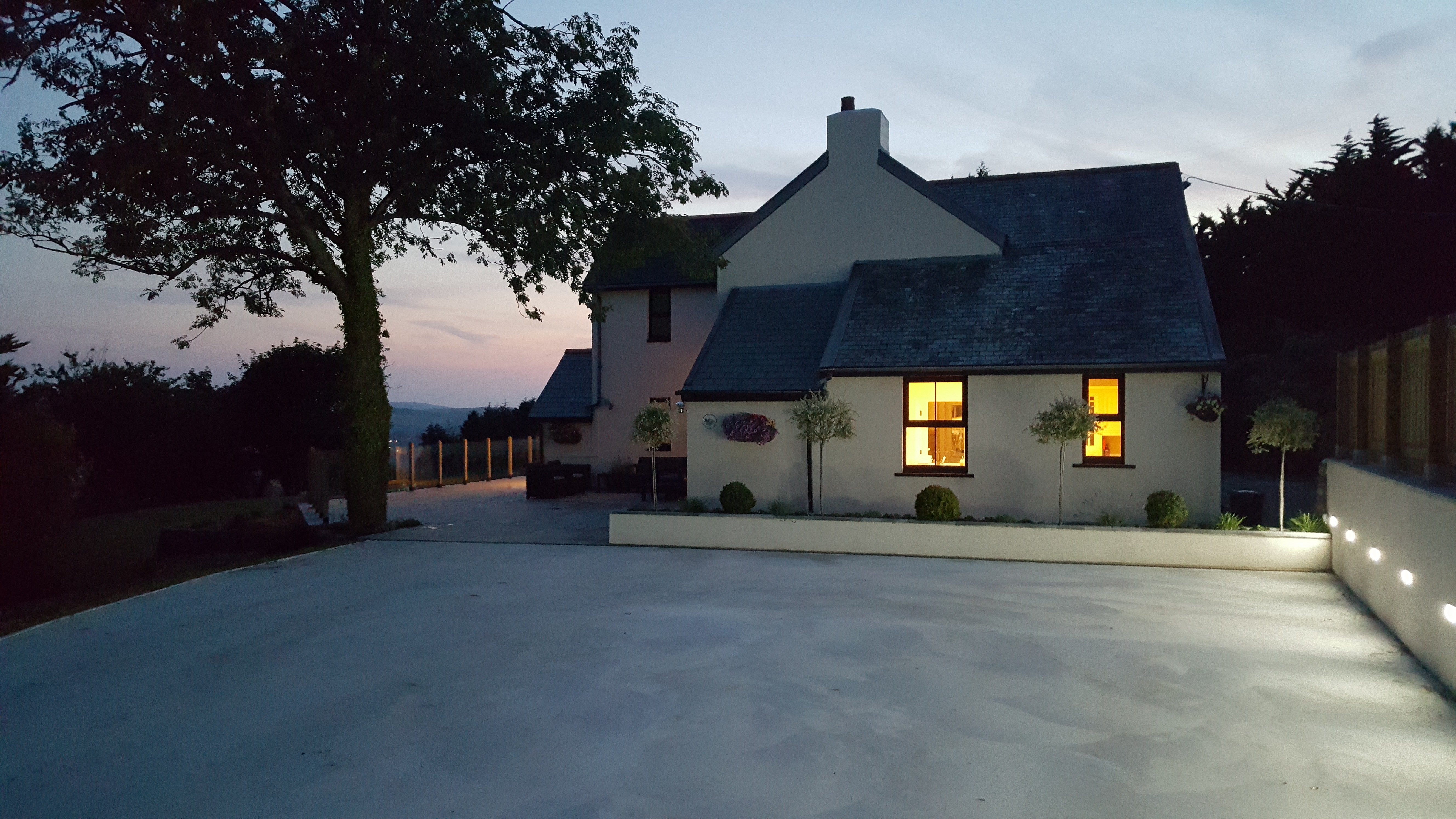 Smooth step-free drive and terrace at Superhost Sam's farm in Devonshire countryside in the UK