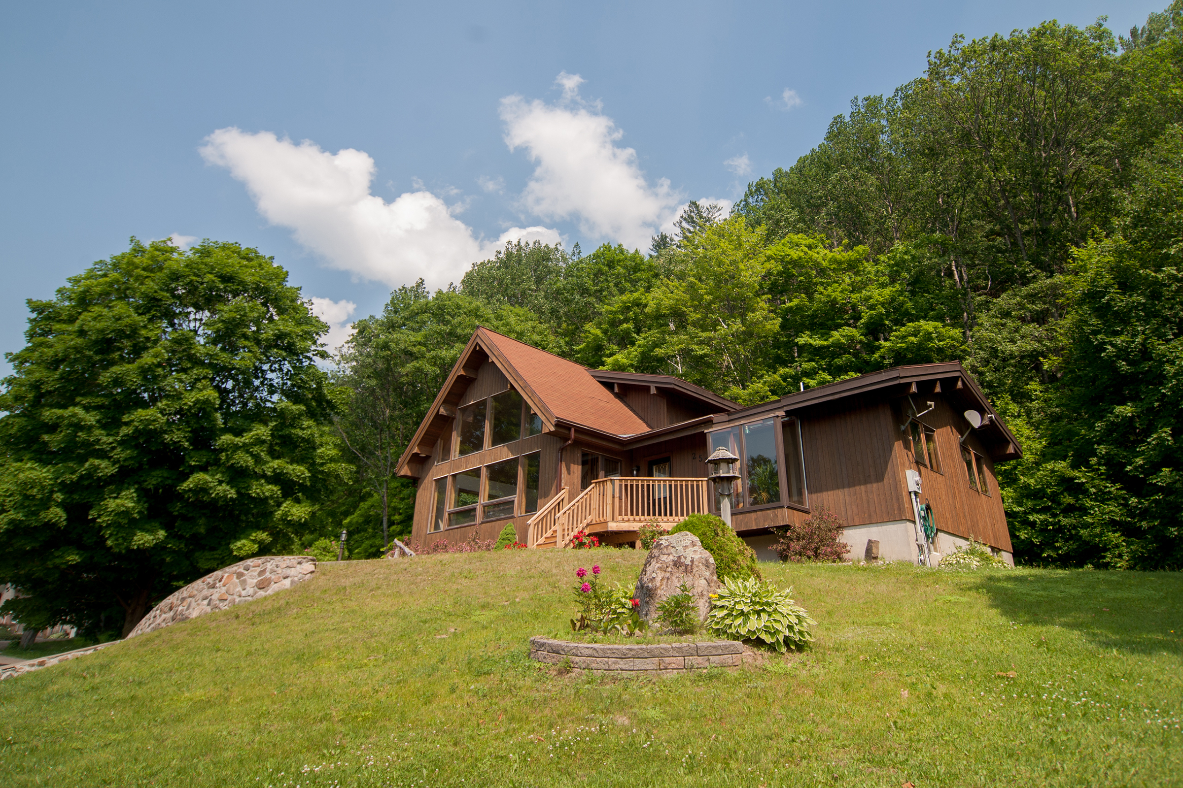 Outdoor exterior view of the Town Cottage with boat launch across the street stay in Bancroft, Canada