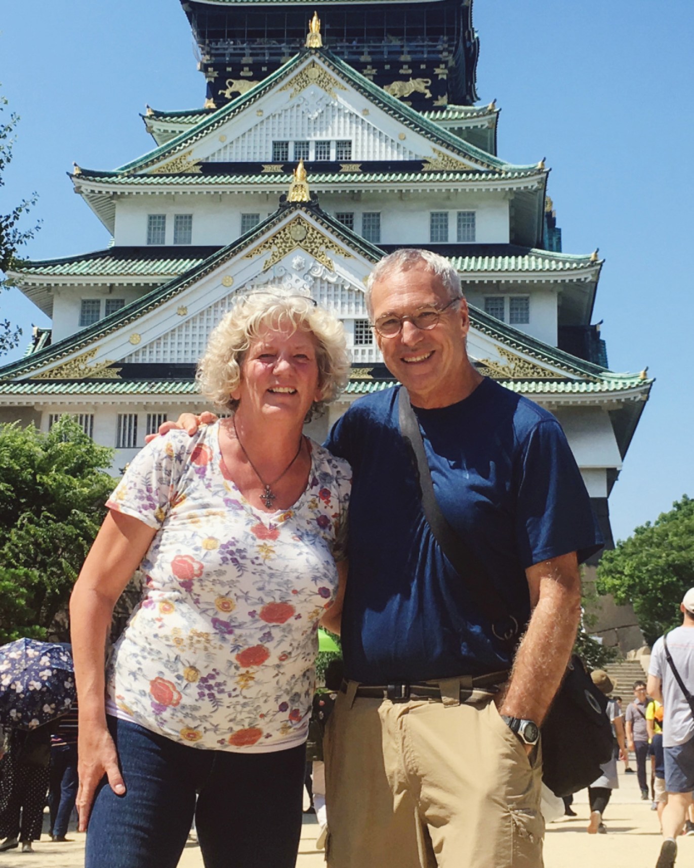 Michael and Debbie, the Senior Nomads standing in front of a monument on one of their trips.