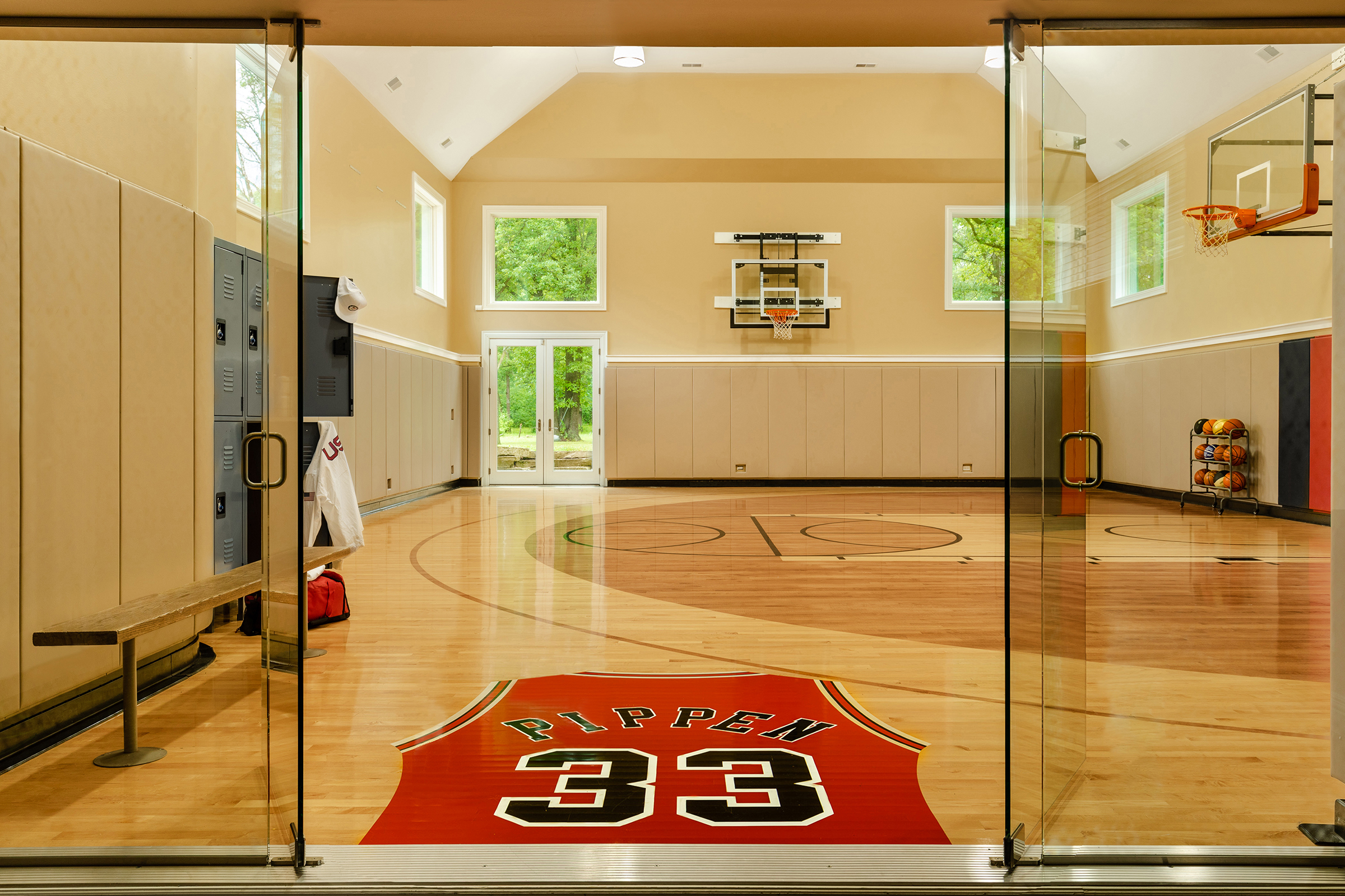 View through the entrance doors of Scottie's indoor basketball court.