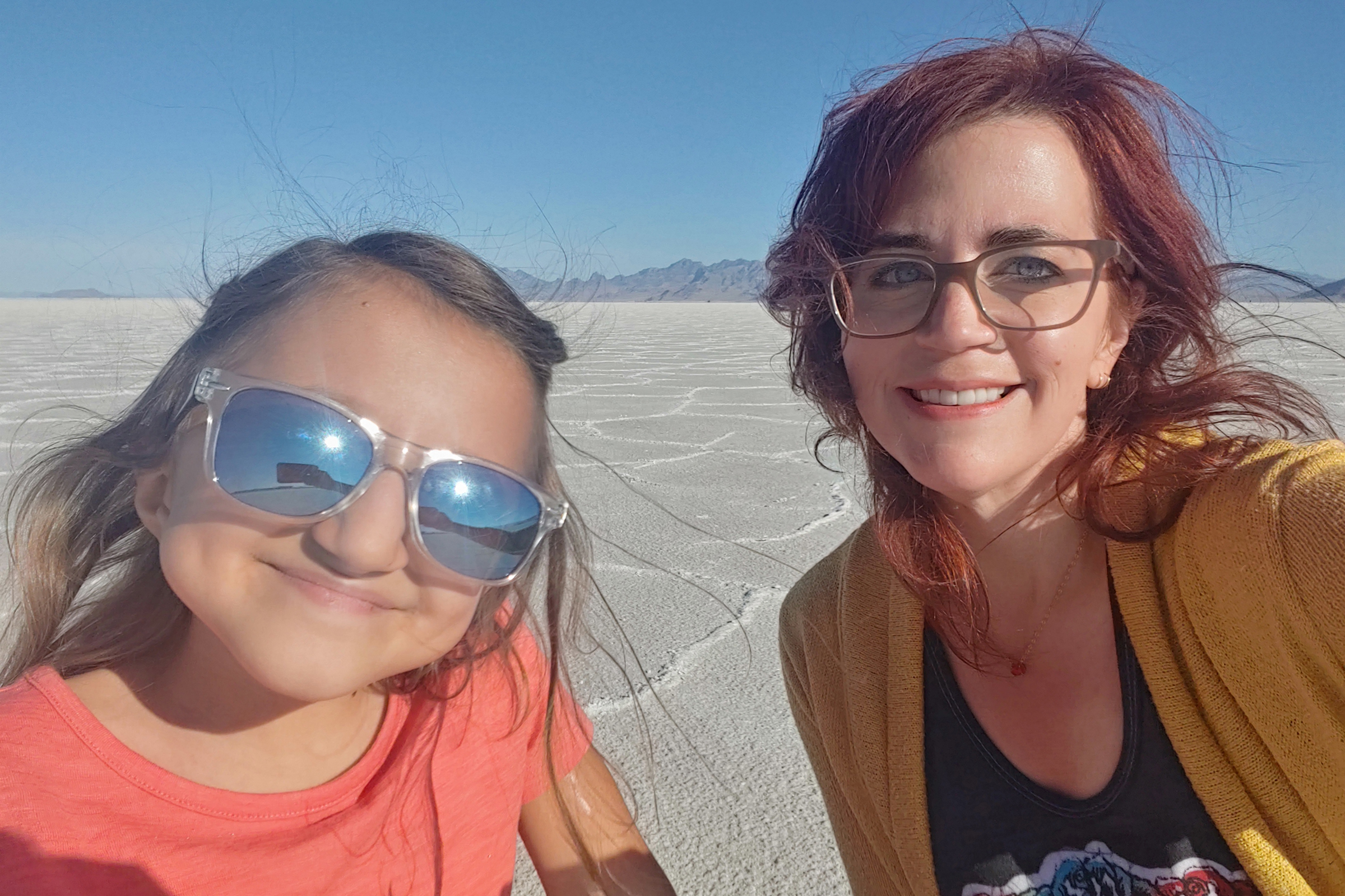 Lindsey taking a selfie with her and her daughter with what appears to be salt baths in the background.