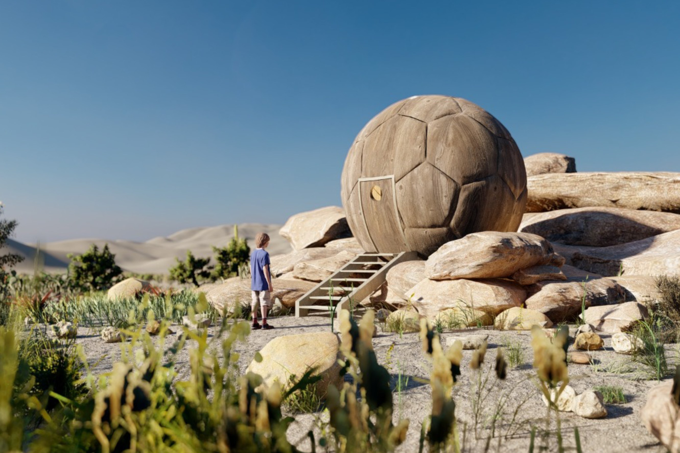 A wooden sphere shaped home nestled in a pile of boulders