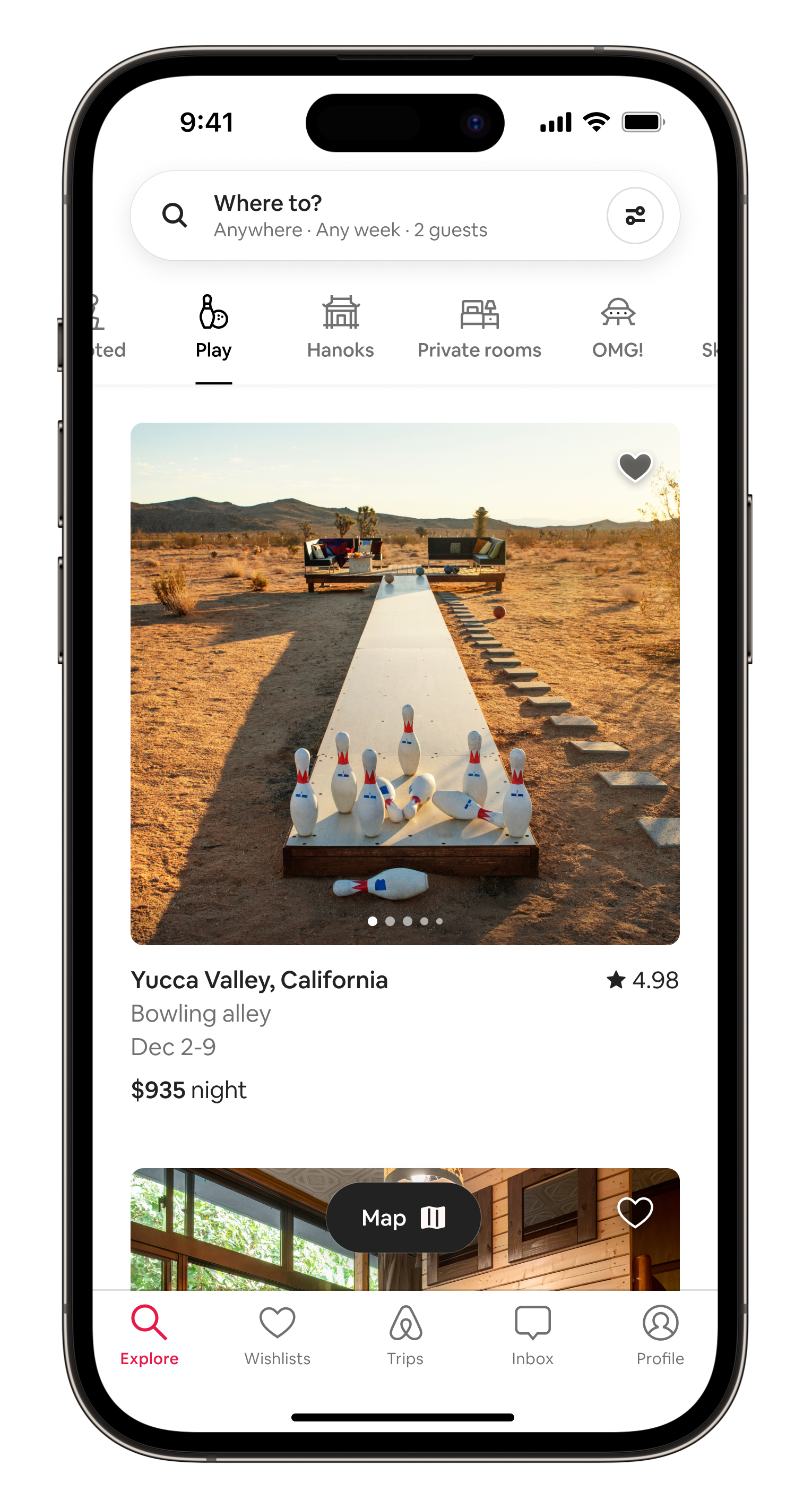 Airbnb Categories product in situ within an iPhone device showing the Play Category. The screen shows a life-sized bowling lane situated in the yard of a desert stay in Yucca Valley, California.