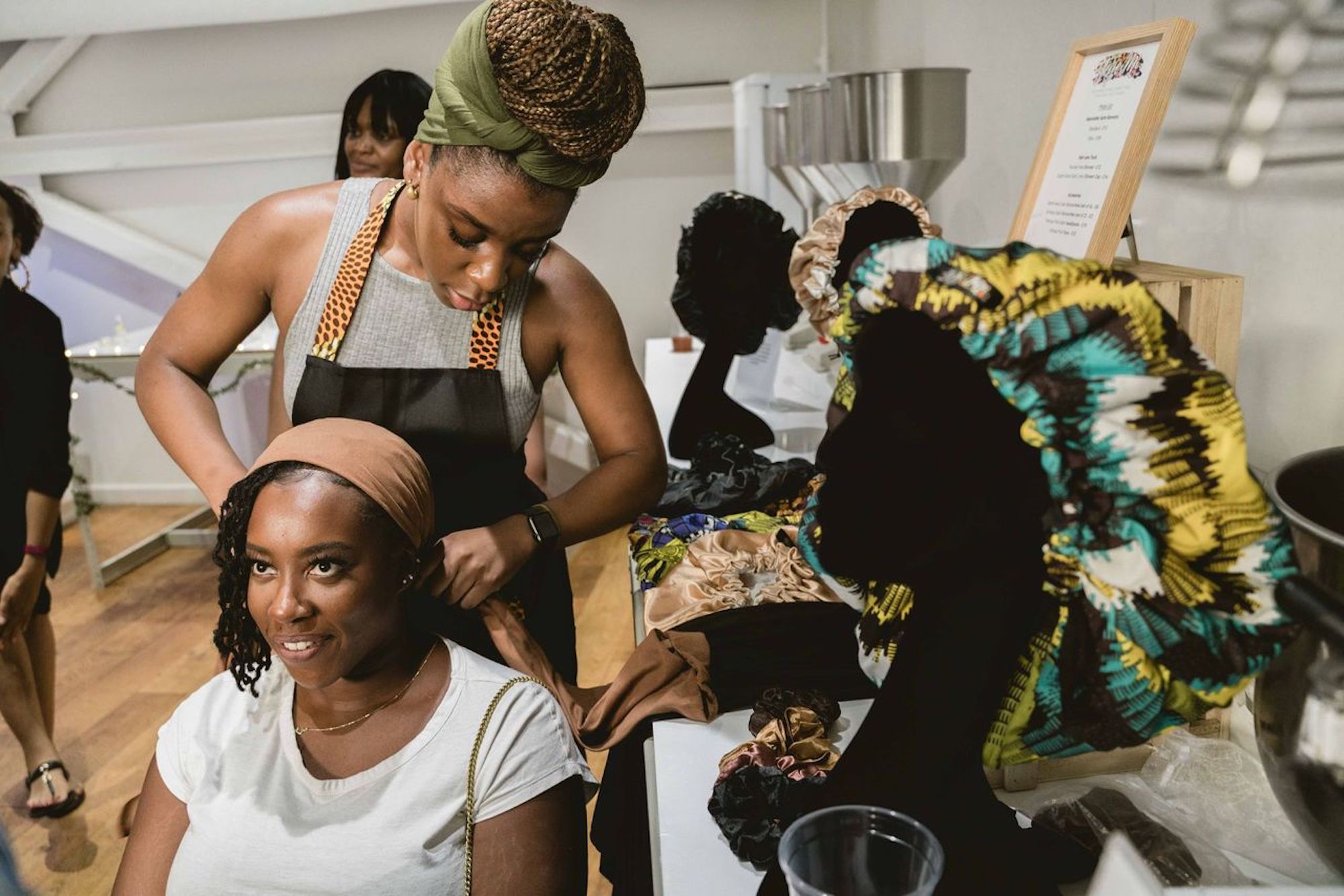 Yeye Mi, a self-care brand showcasing tools and accessories for afro-curly textured hair at a Jamii-Airbnb event last Christmas.