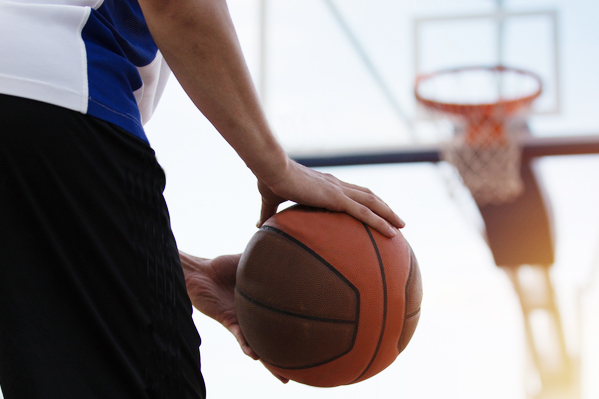 Person playing basketball