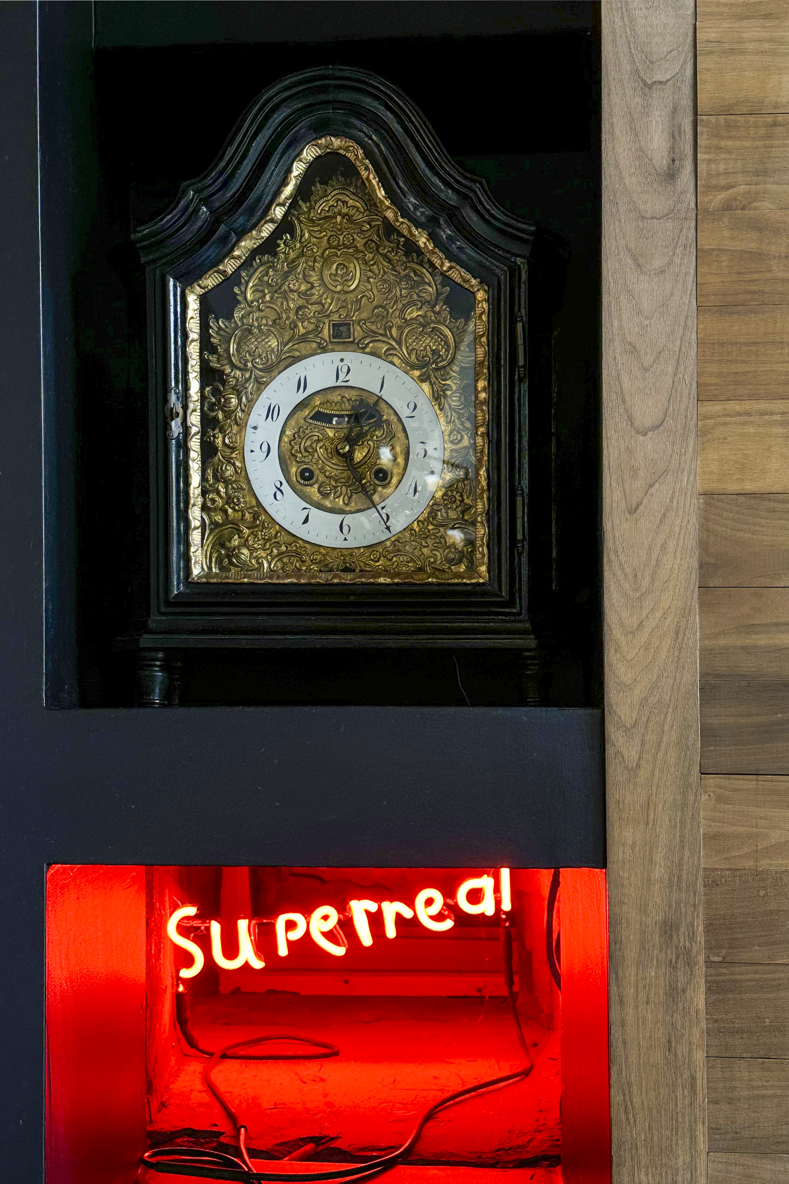 Eclectic, black and gold grandfather clock with a modern twist.