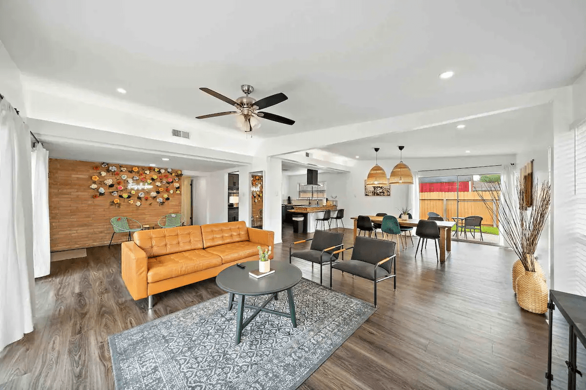 Image depicting living and dining area in an affordable Houston Airbnb