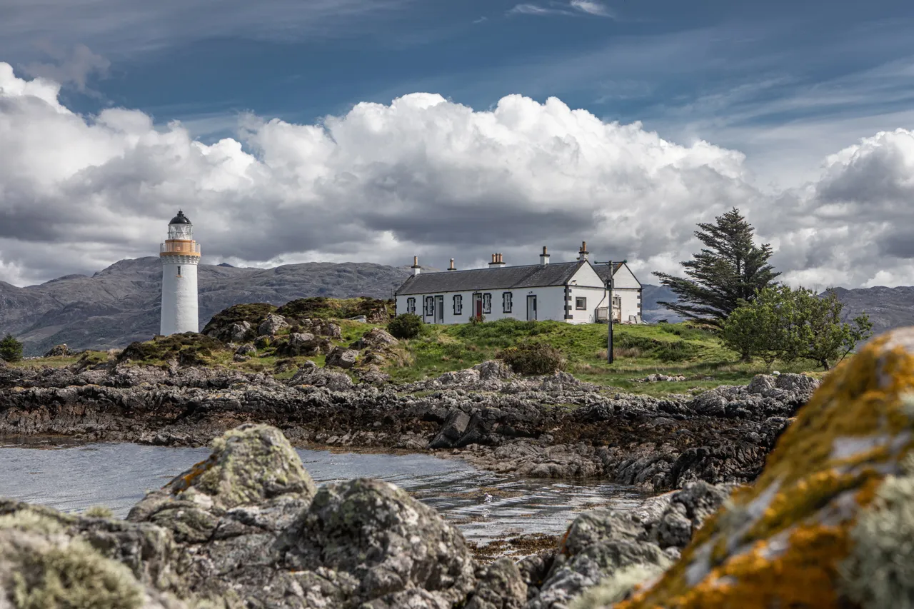 A private island lighthouse and lighthouse keeper's cottage in Scotland.