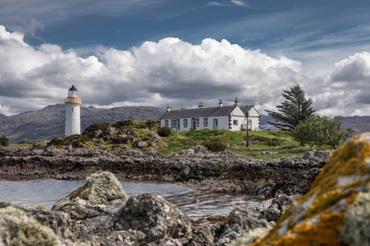 A private island lighthouse and lighthouse keeper's cottage in Scotland.
