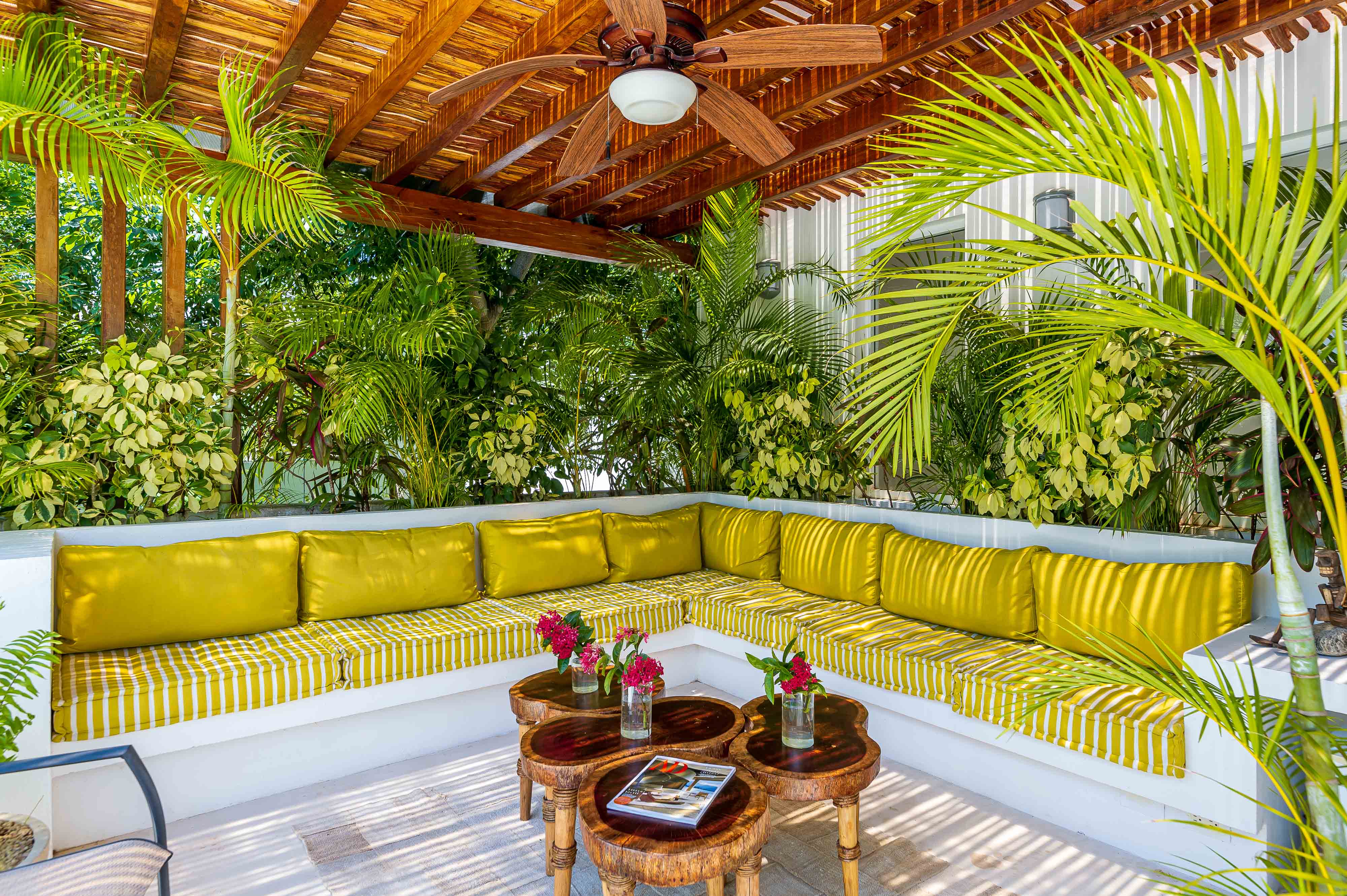 Protected outdoor seating area of "Chic & Mexican Villa, a True Oasis Pool, Security" listing
