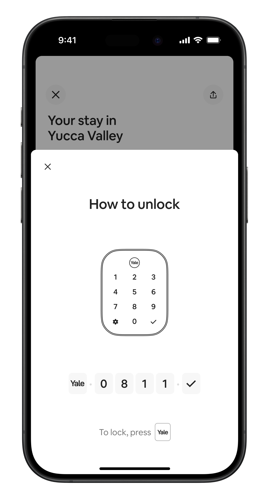 Phone screen with instructions for unlocking a Yale lock.