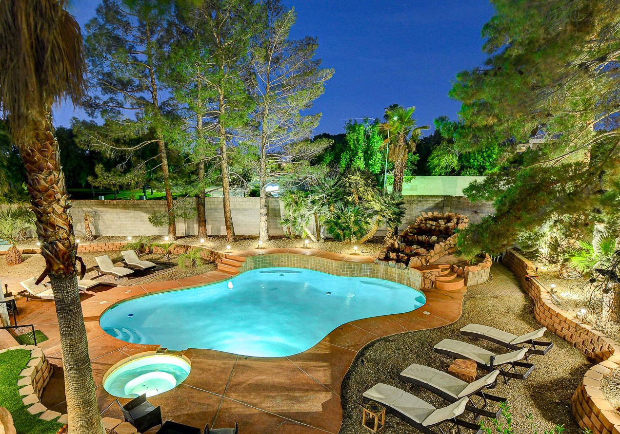 Pool and backyard at Spacious Modern Home with Pool 