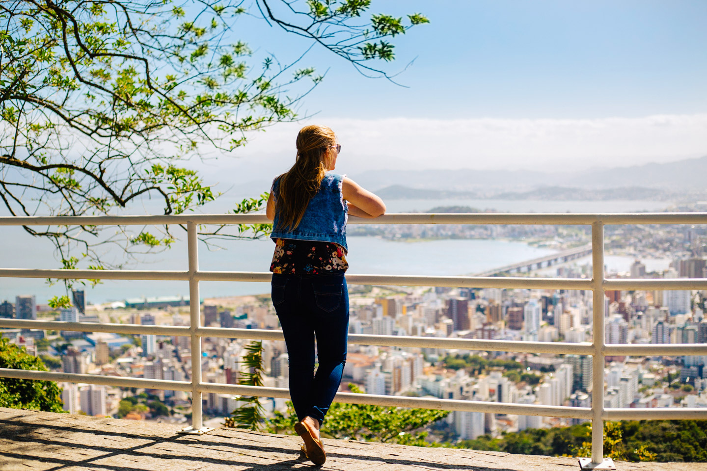Girl in gazebo looking view of Florianopolis.