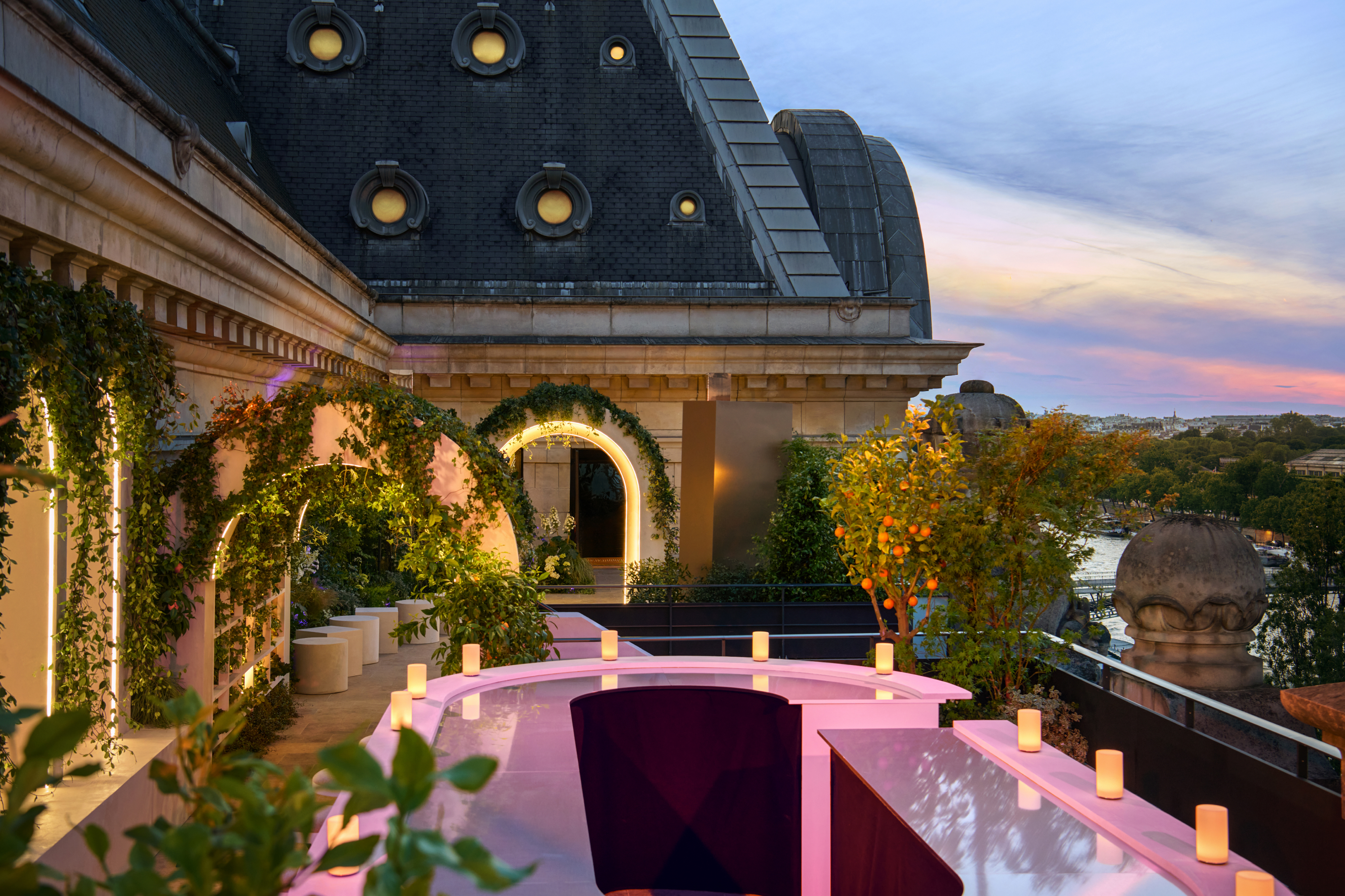 A view of the tasting bar on the terrace, a neo pink donut-shaped structure.