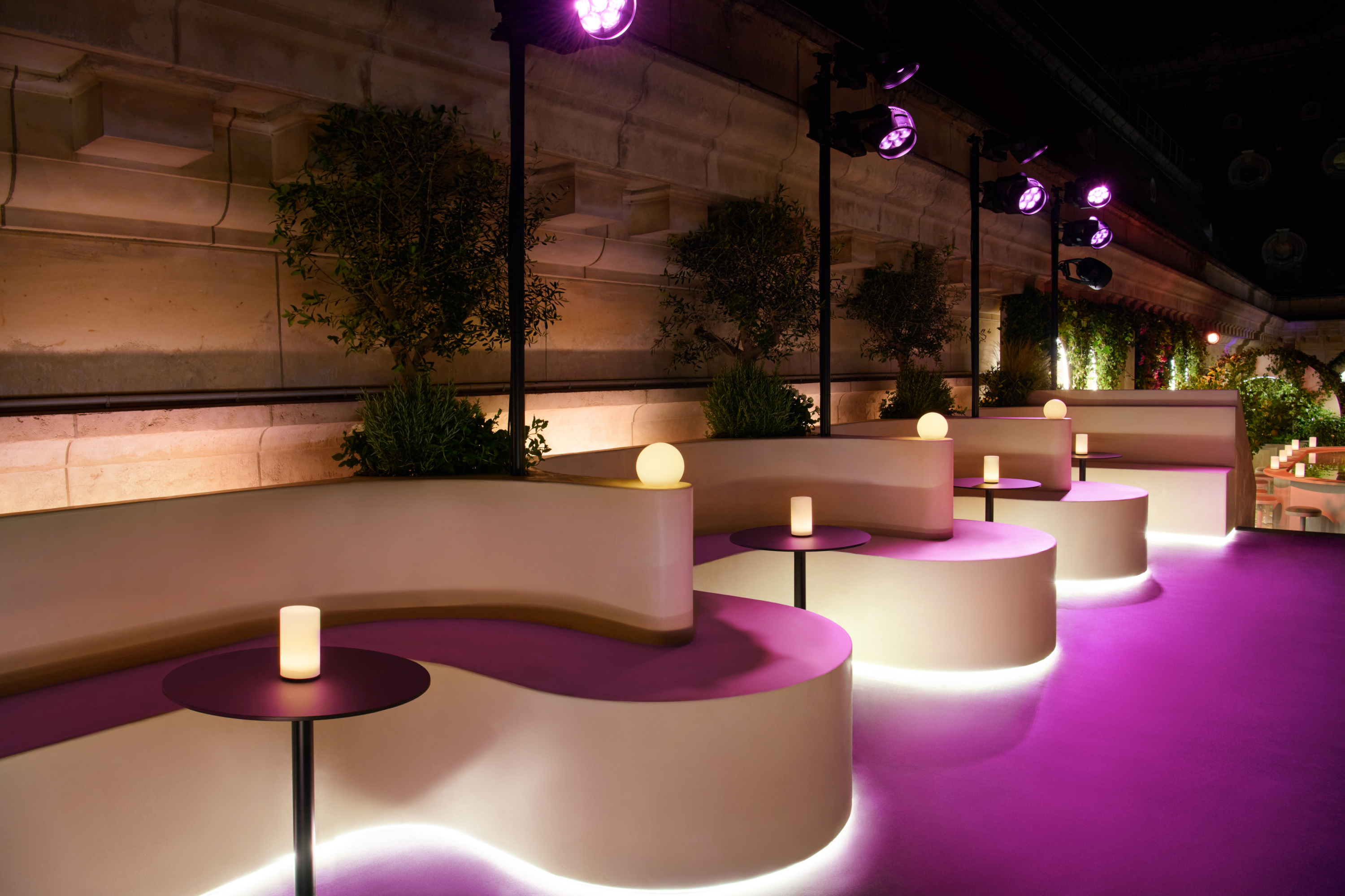 A close up of some of the seating on the terrace - a wavy shaped pink banquette