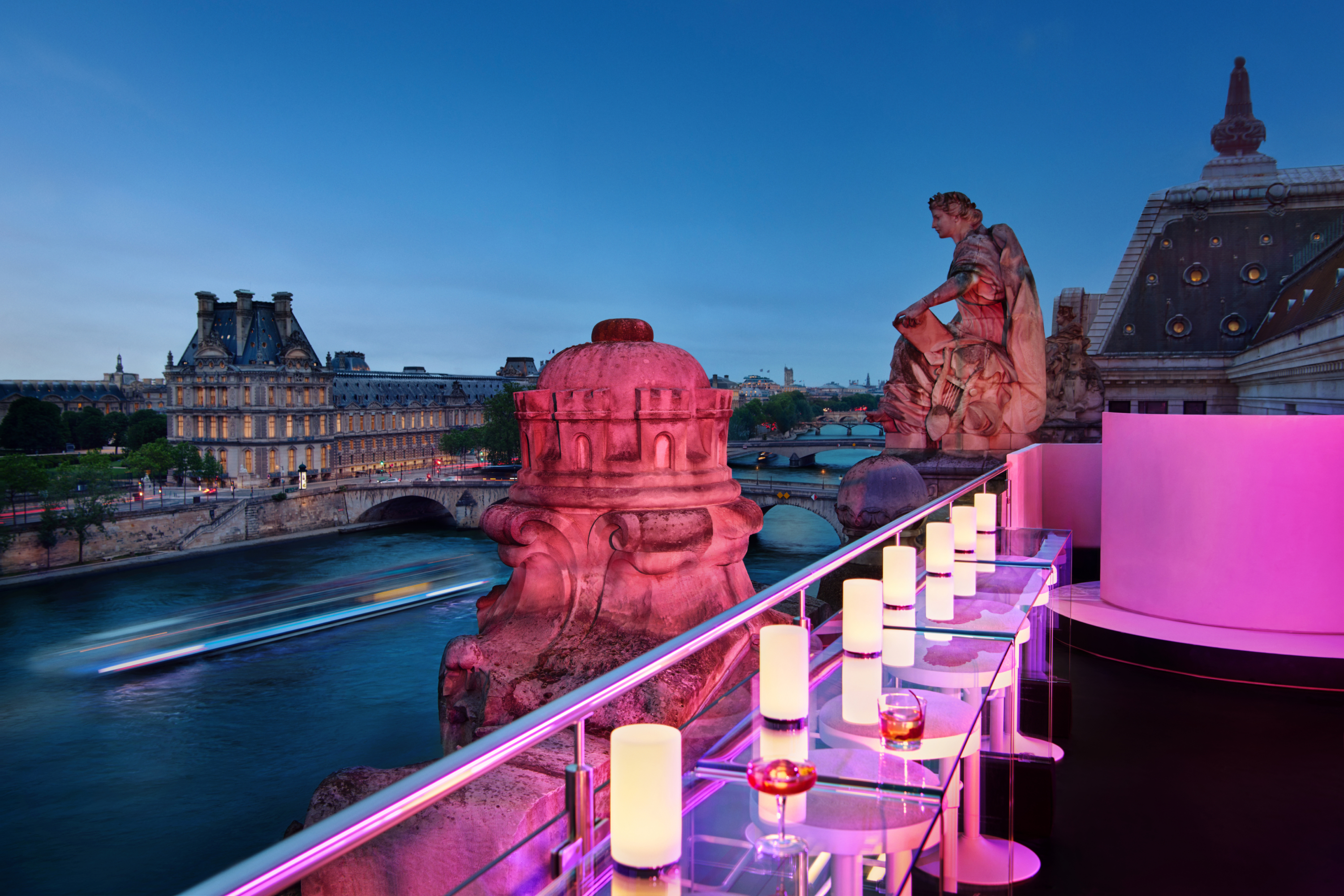 View from the terrace to the River Seine, with the specially installed high tables and stools in the foreground.