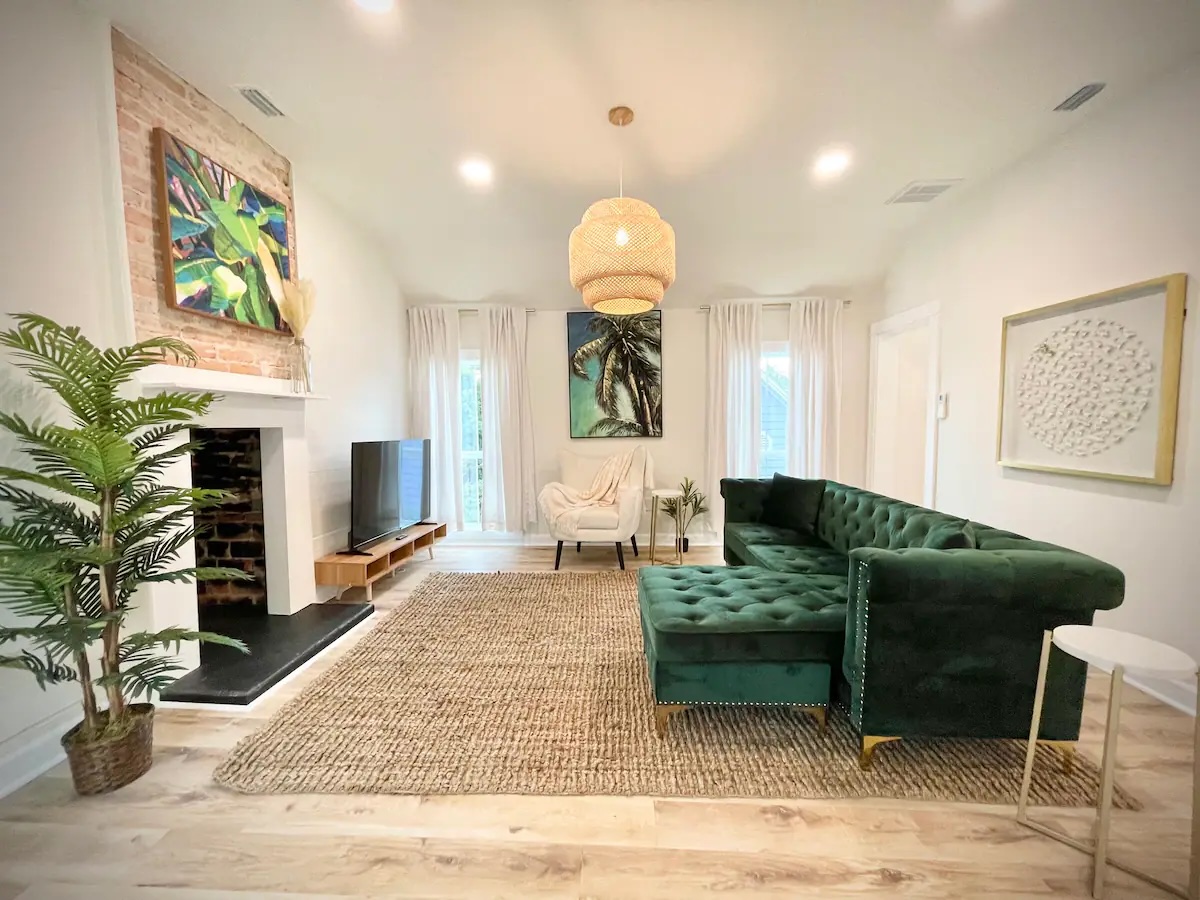 Living room with green velvet couch