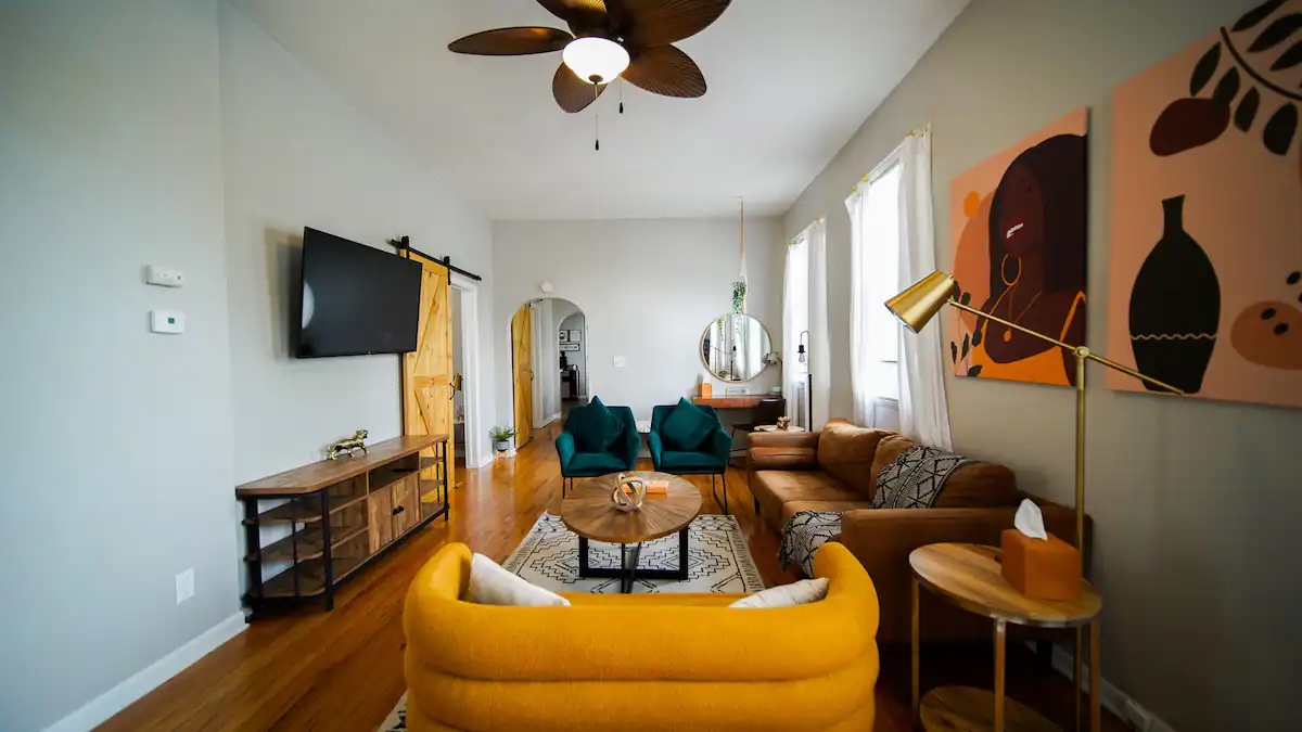 Living room with yellow couch