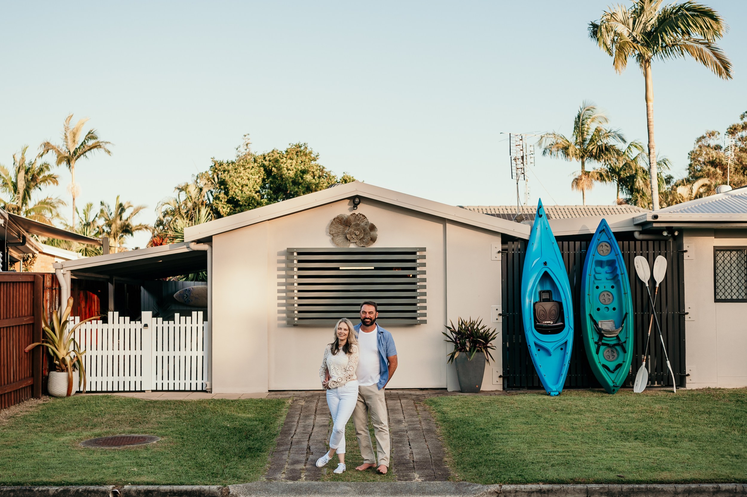 Image of host of the year 2024 winners for Australia standing out the front of their Airbnb