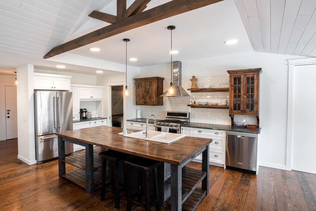 White kitchen with wood fixtures