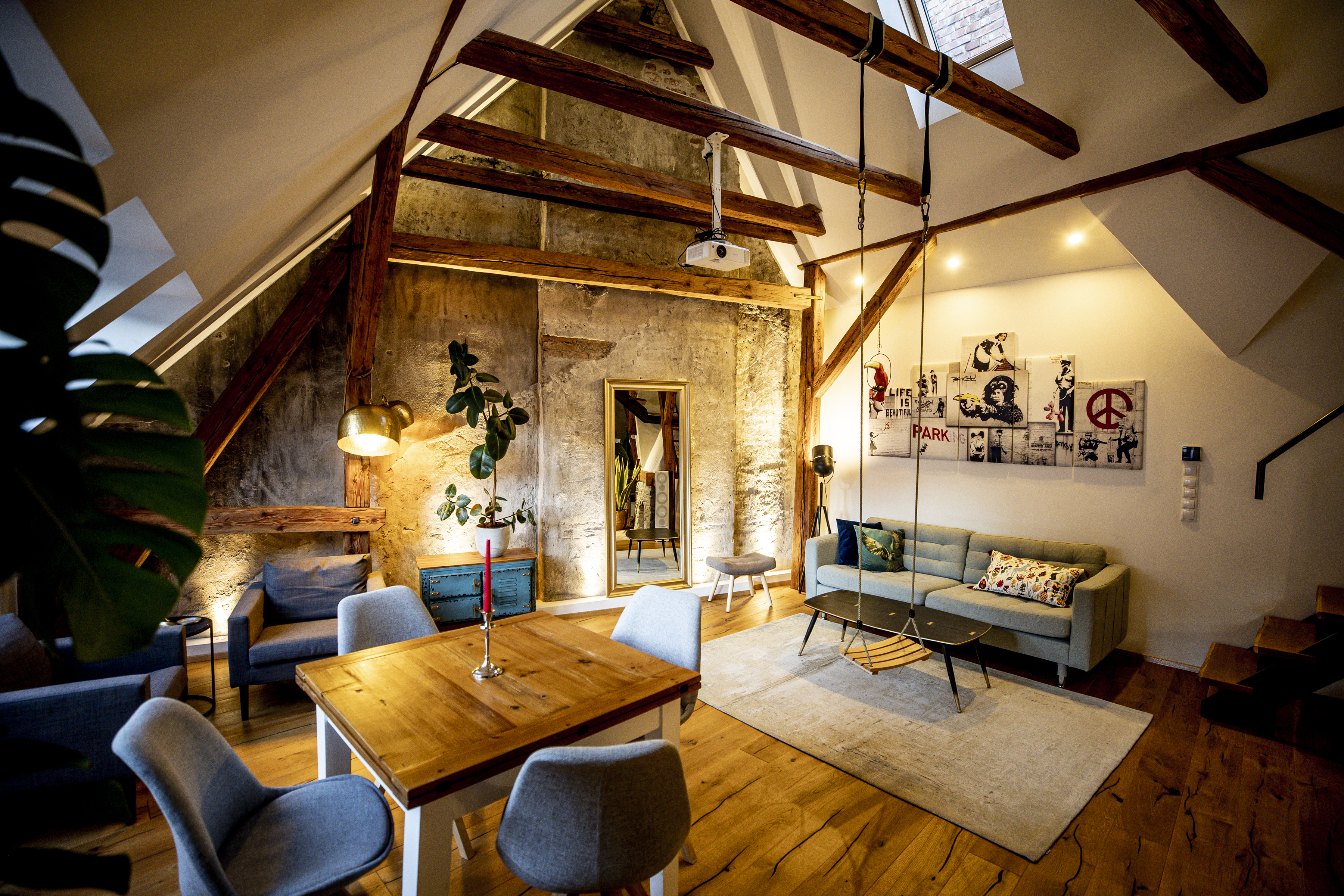 Interior of a loft with small dining table