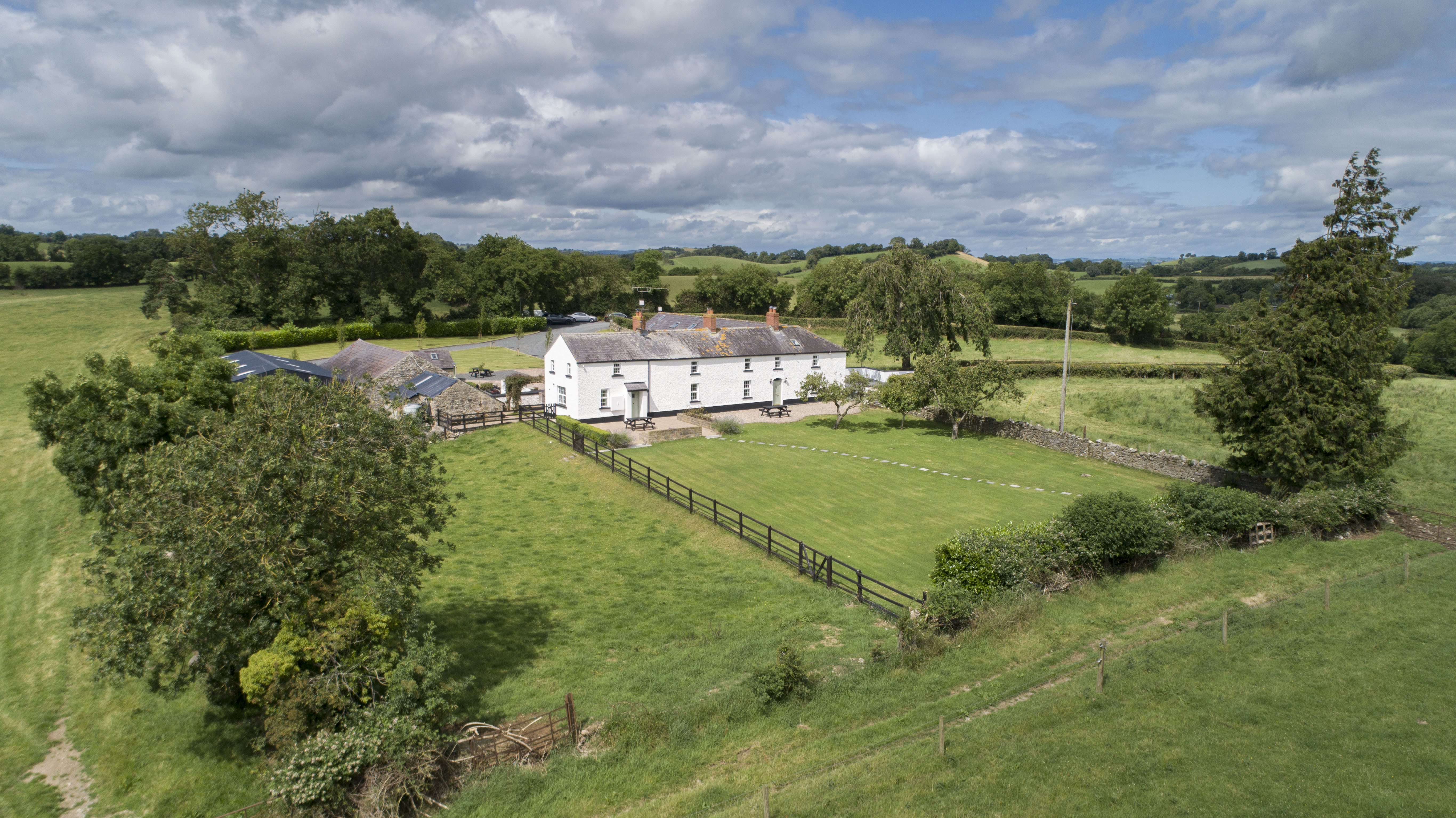 Farmhouse in the middle of green pastures