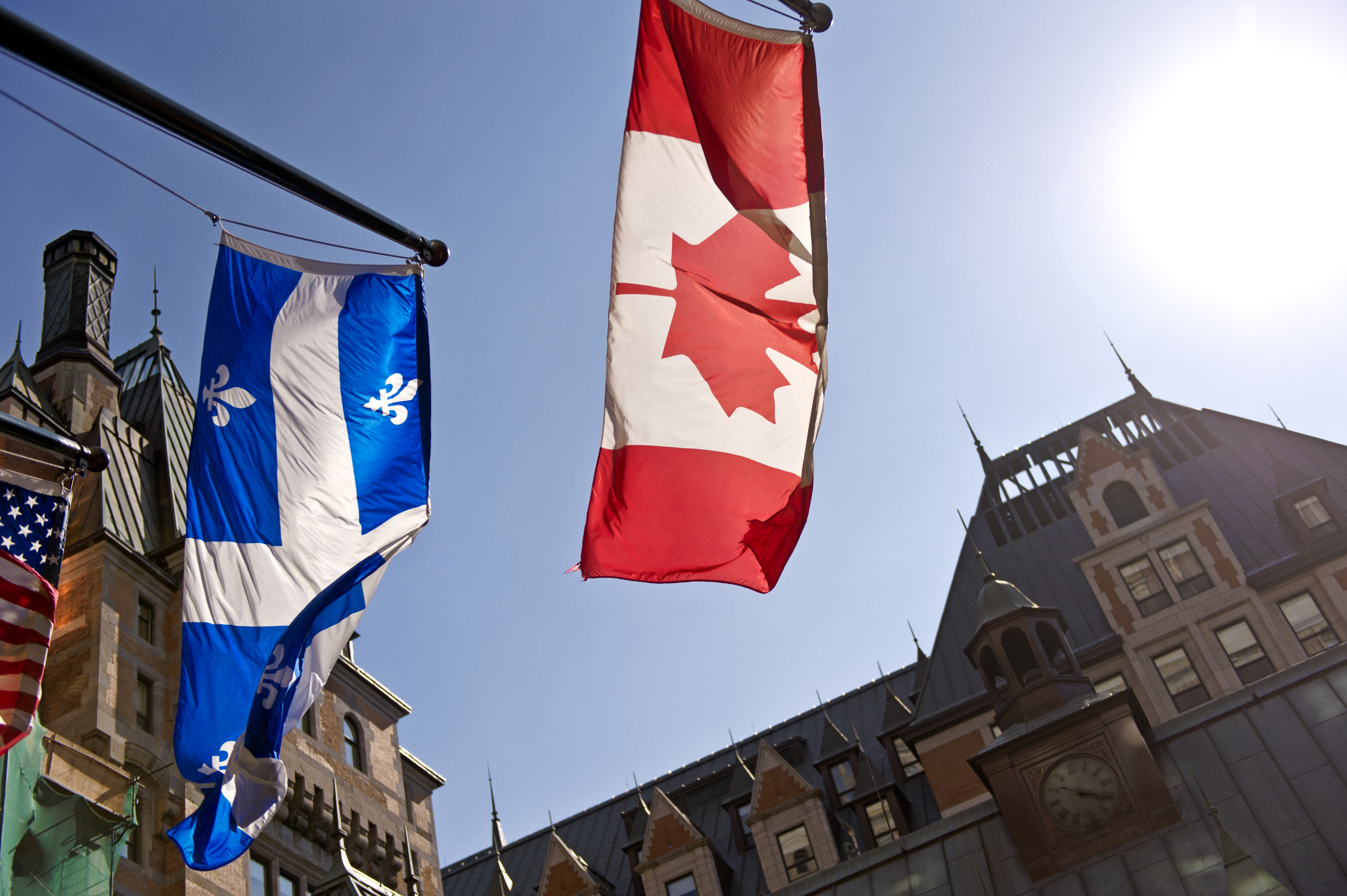 The Canadian and Quebec flags on a spring day in Québec City.