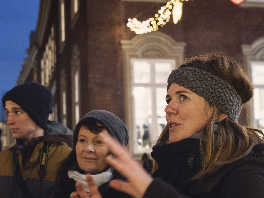 A tour guide explaining Christmas in Copenhagen.